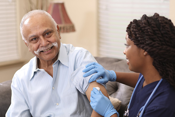 Image depicting patient being vaccinated